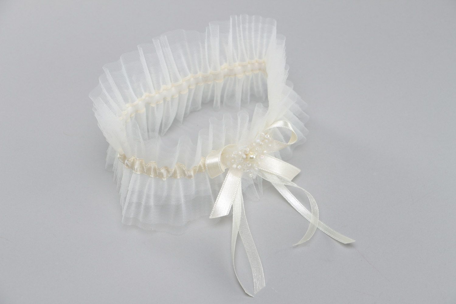 Handmade ivory colored veiling wedding bridal garter with satin ribbon and pearl photo 2