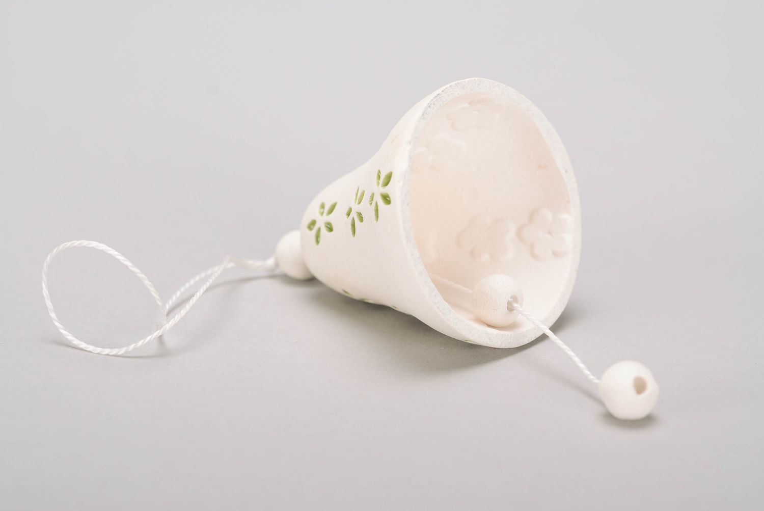 Bell handmade made of white clay photo 1