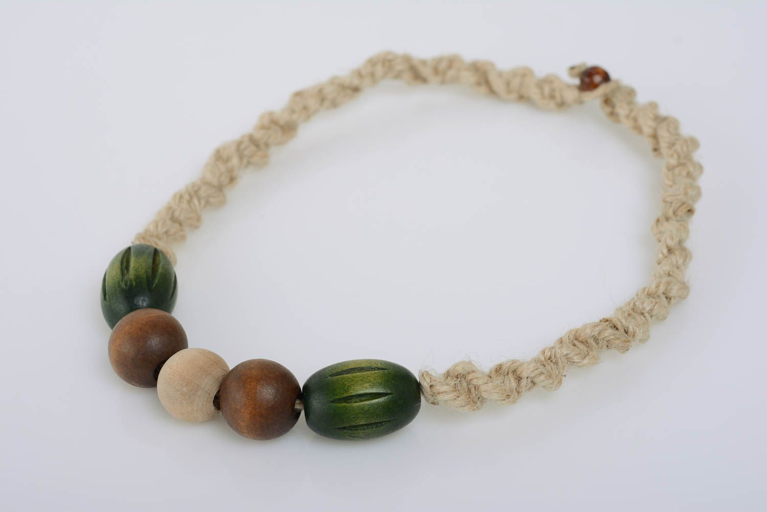 Handmade summer macrame woven necklace with brown and green wooden beads photo 1