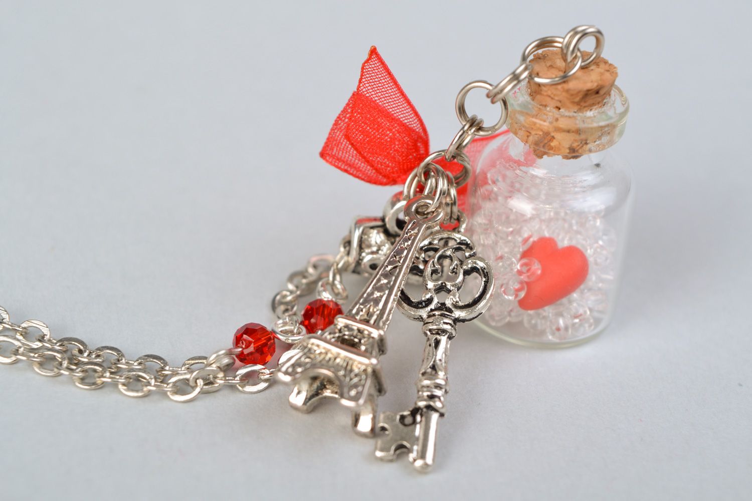 Handmade glass bottle pendant on long chain with metal charm for women photo 4