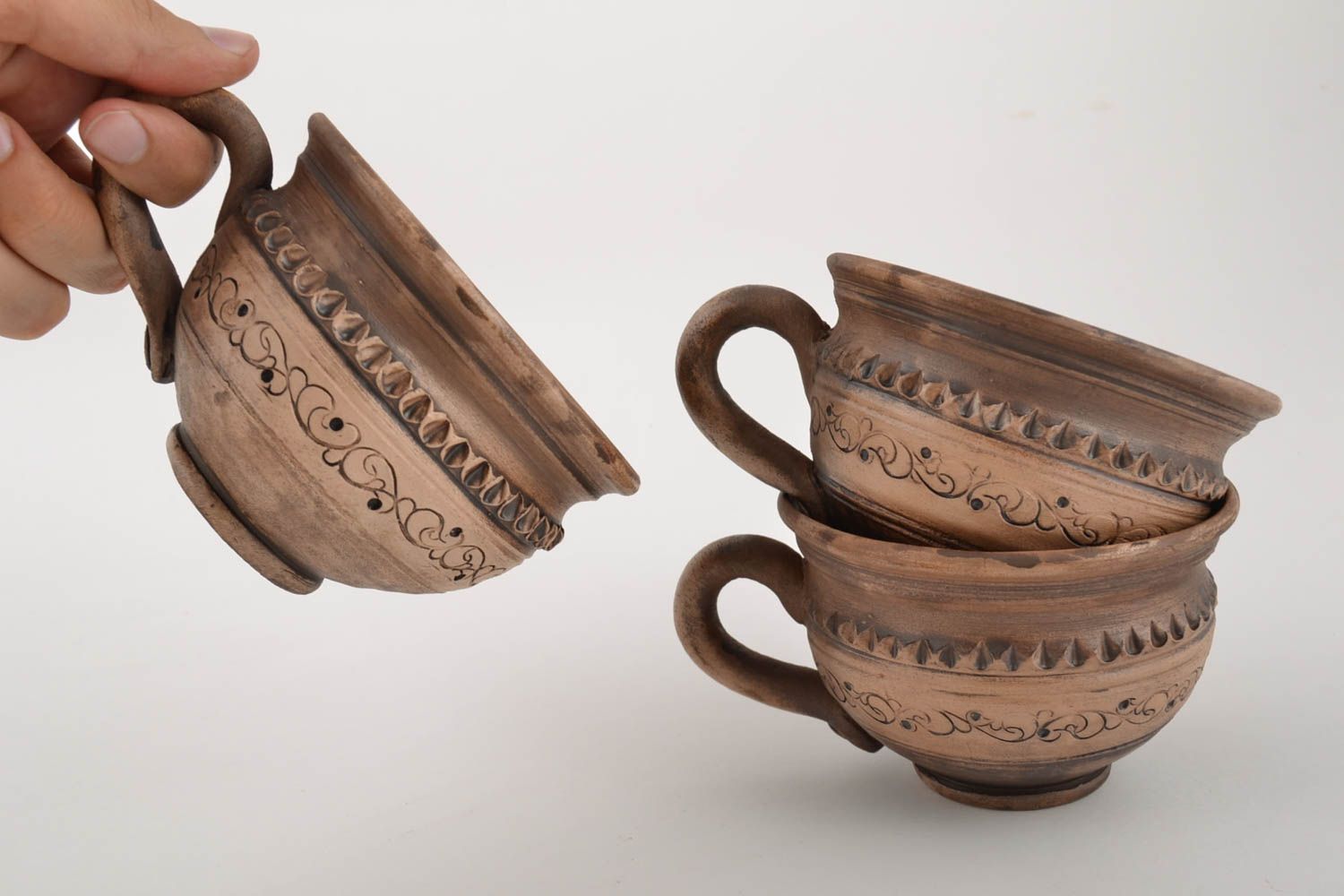 Juego cerámico de tazas de arcilla hechas a mano originales cerámica lechera foto 2
