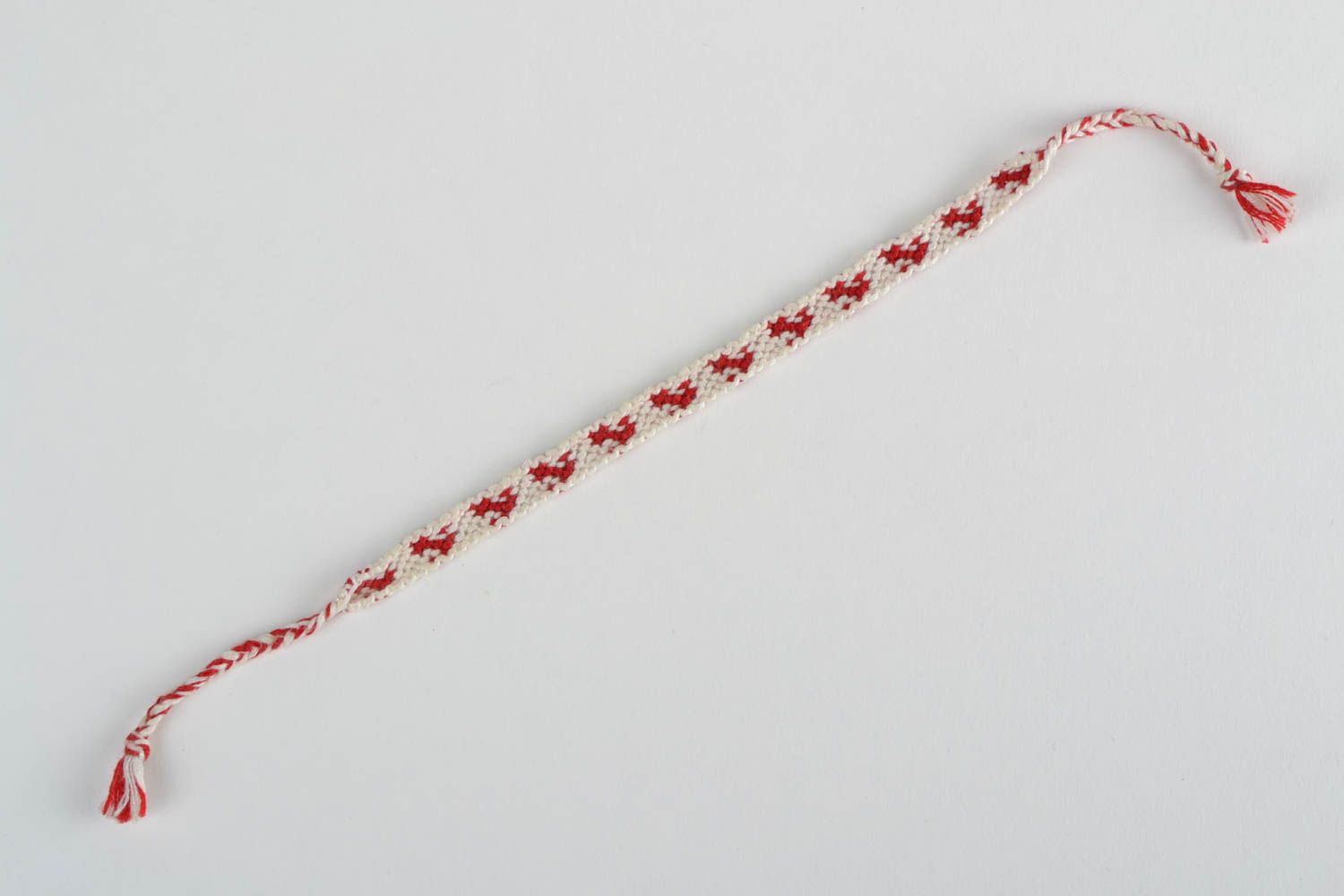 Handmade thin white and red friendship wrist bracelet woven of threads for girls photo 5