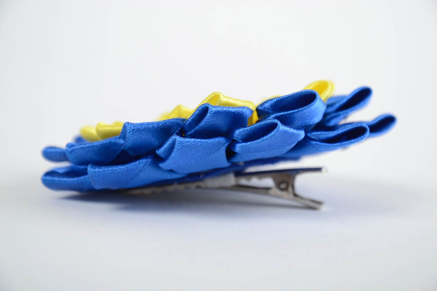 Handmade blue and yellow puffy hair clip with a flower of satin ribbons photo 4