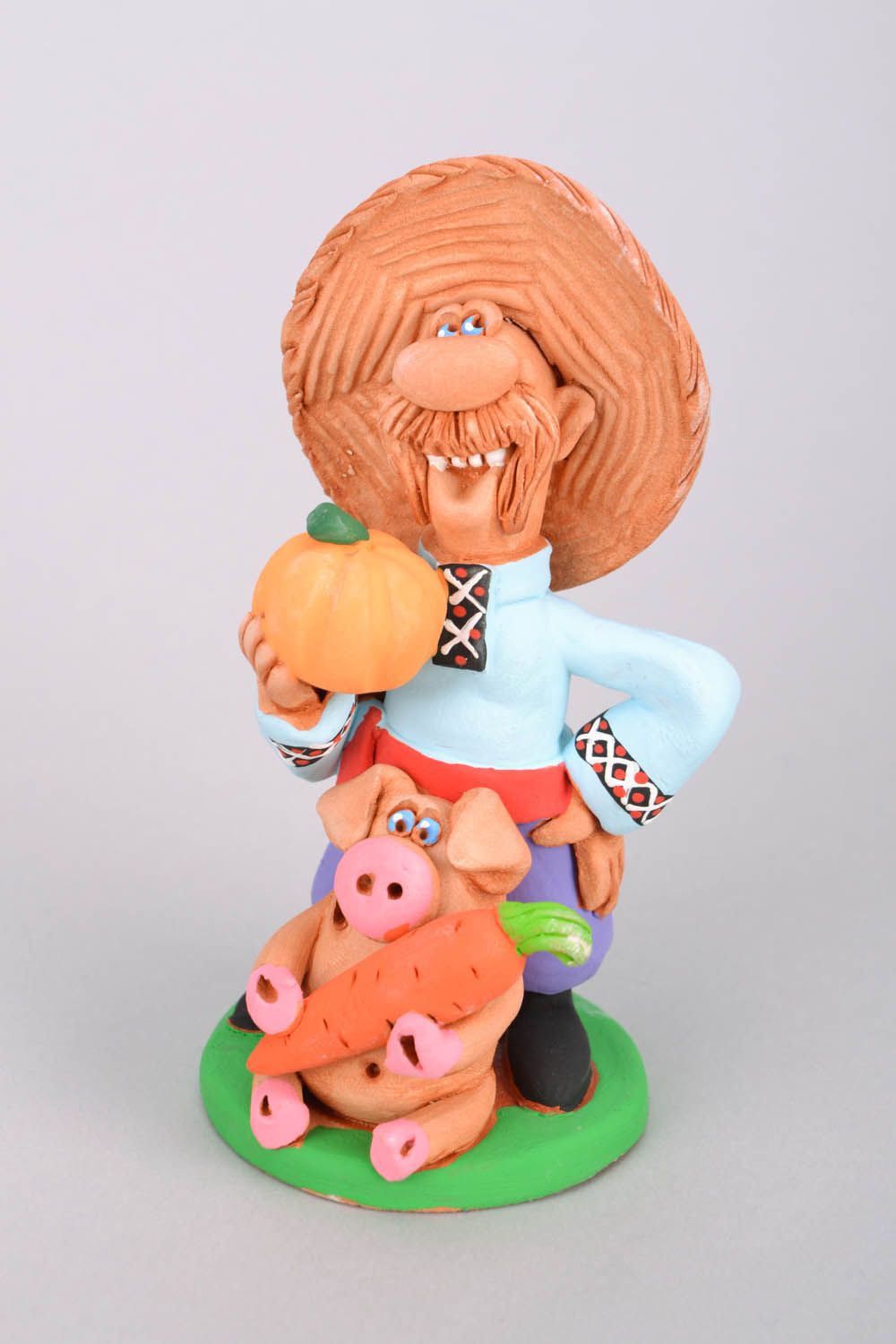 Ceramic figurine Cossack with a Big Piggy photo 3
