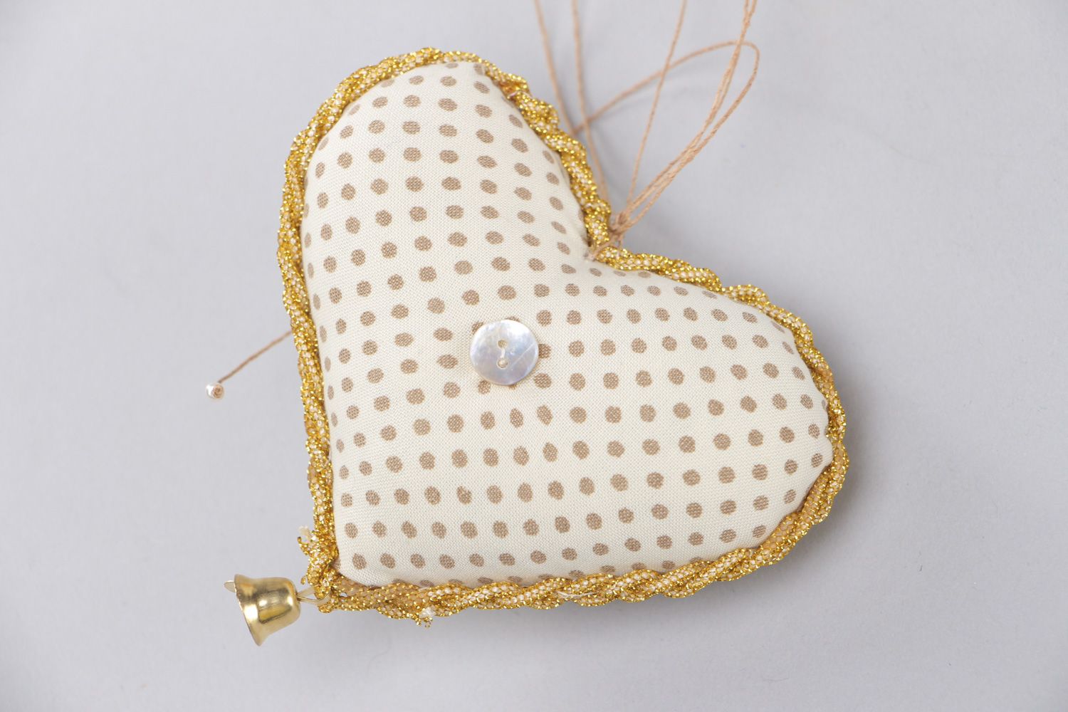 Handmade heart-shaped wall hanging sewn of polka dot fabric for interior decoration photo 3