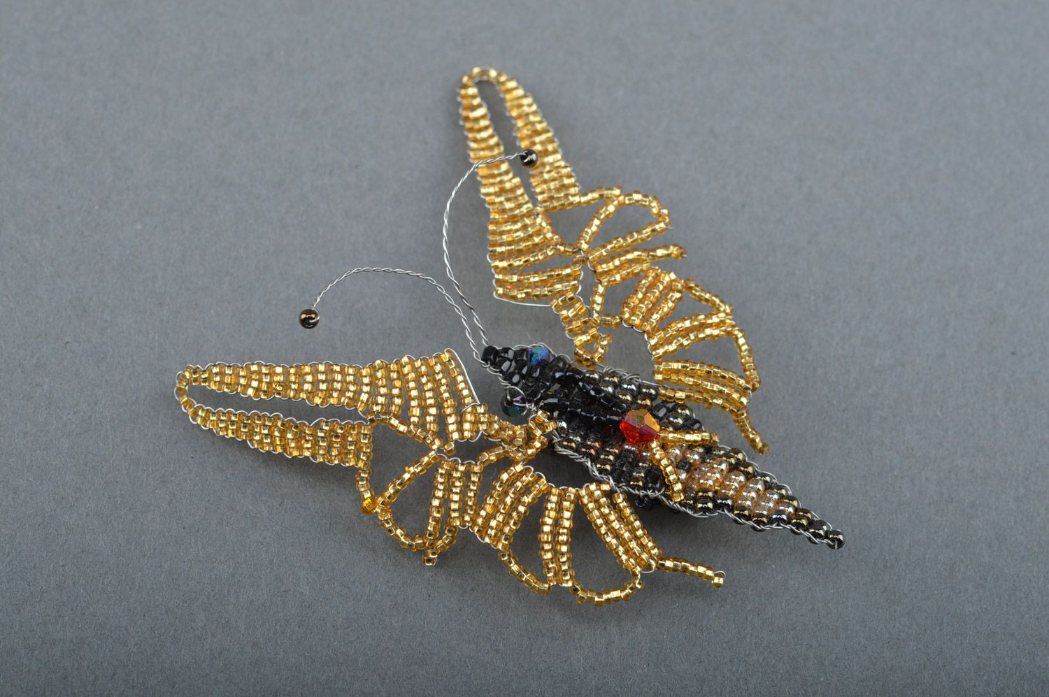 Handmade beaded brooch butterfly of gold and black colors and average size photo 4