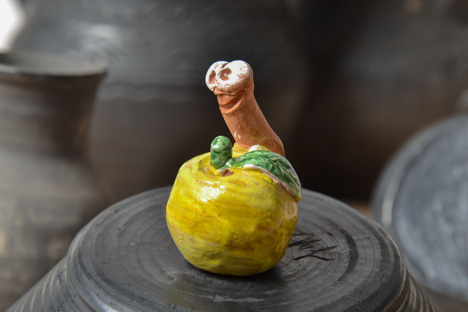 Clay statuette Worm in Apple photo 1
