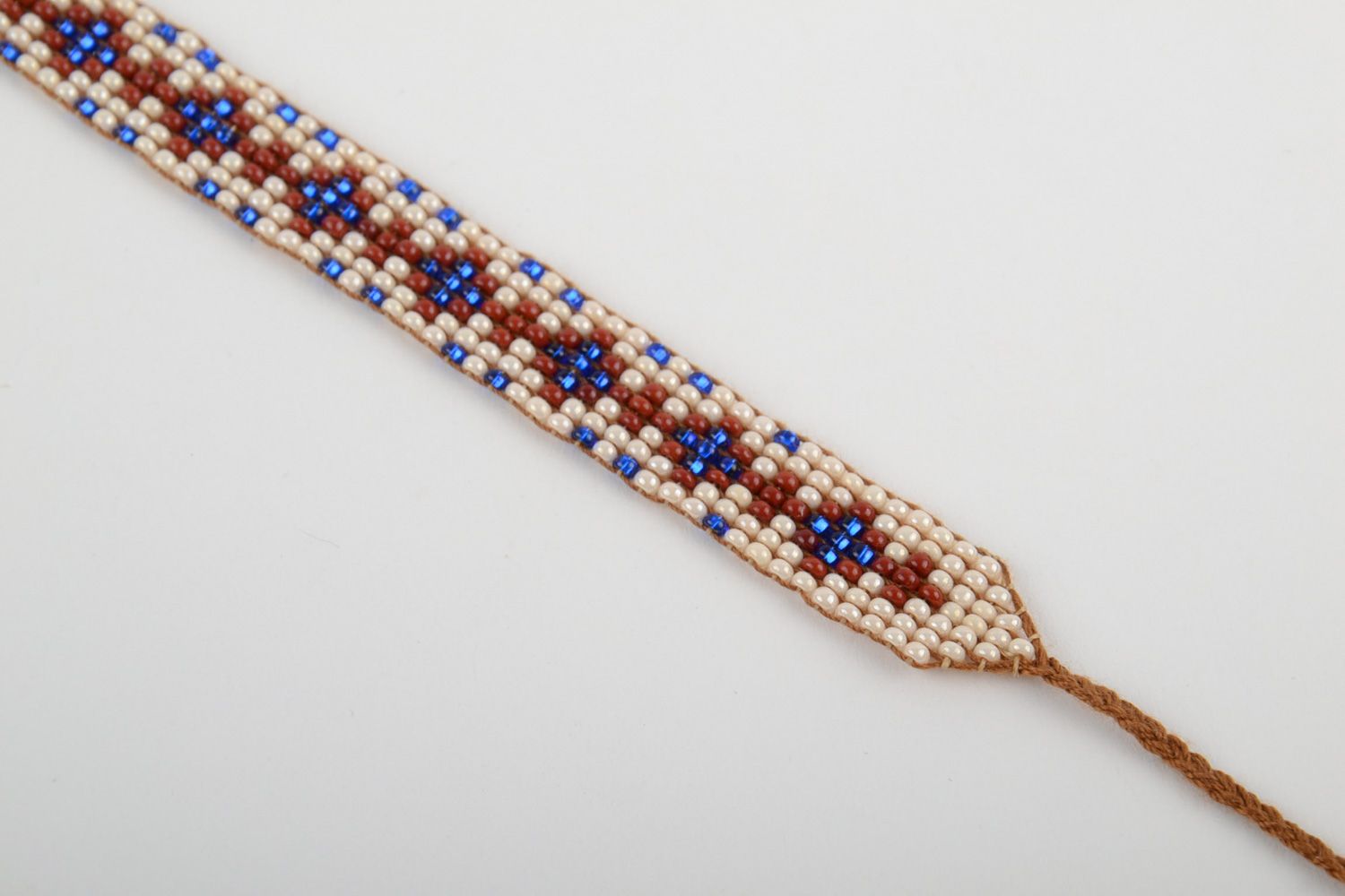 Beautiful handmade wide beaded bracelet with ethnic pattern photo 3