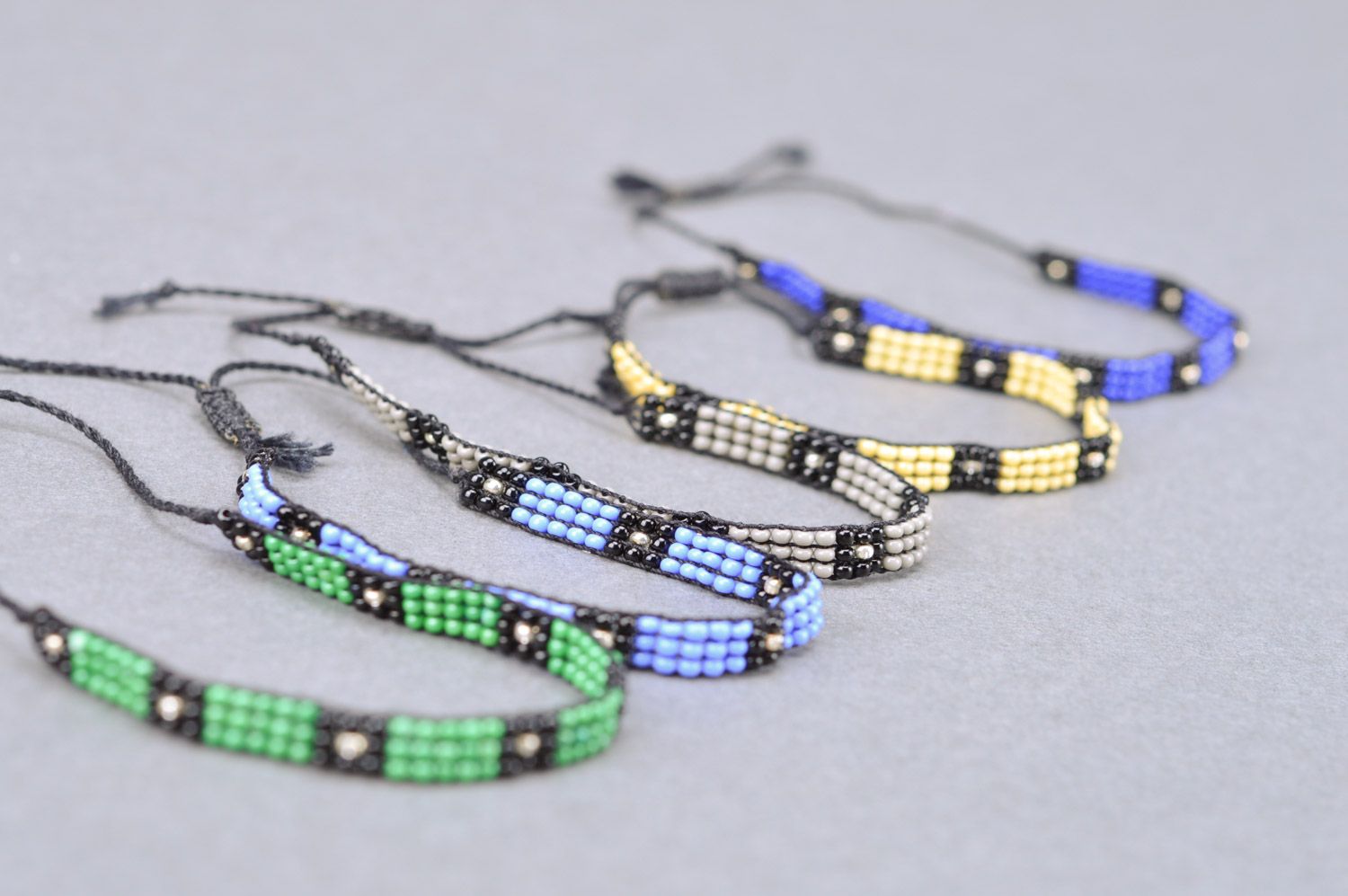 Set of bright handmade men's woven bead wrist bracelets with ties 5 pieces photo 2