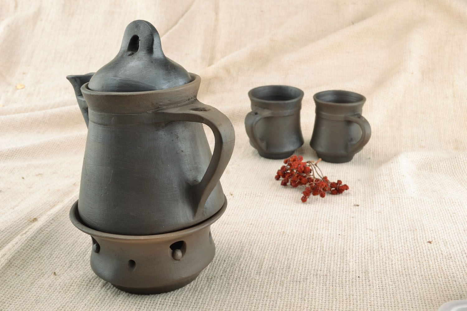 Schwarze Teekanne aus Keramik foto 5