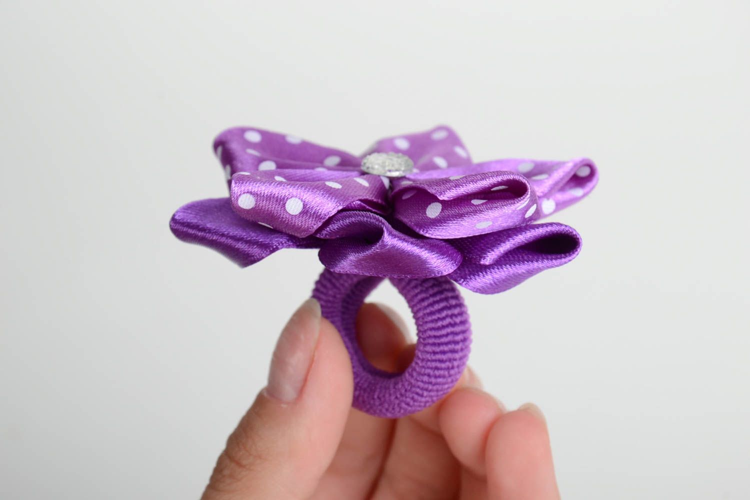 Homemade designer hair band with kanzashi flower folded of violet ribbons photo 5