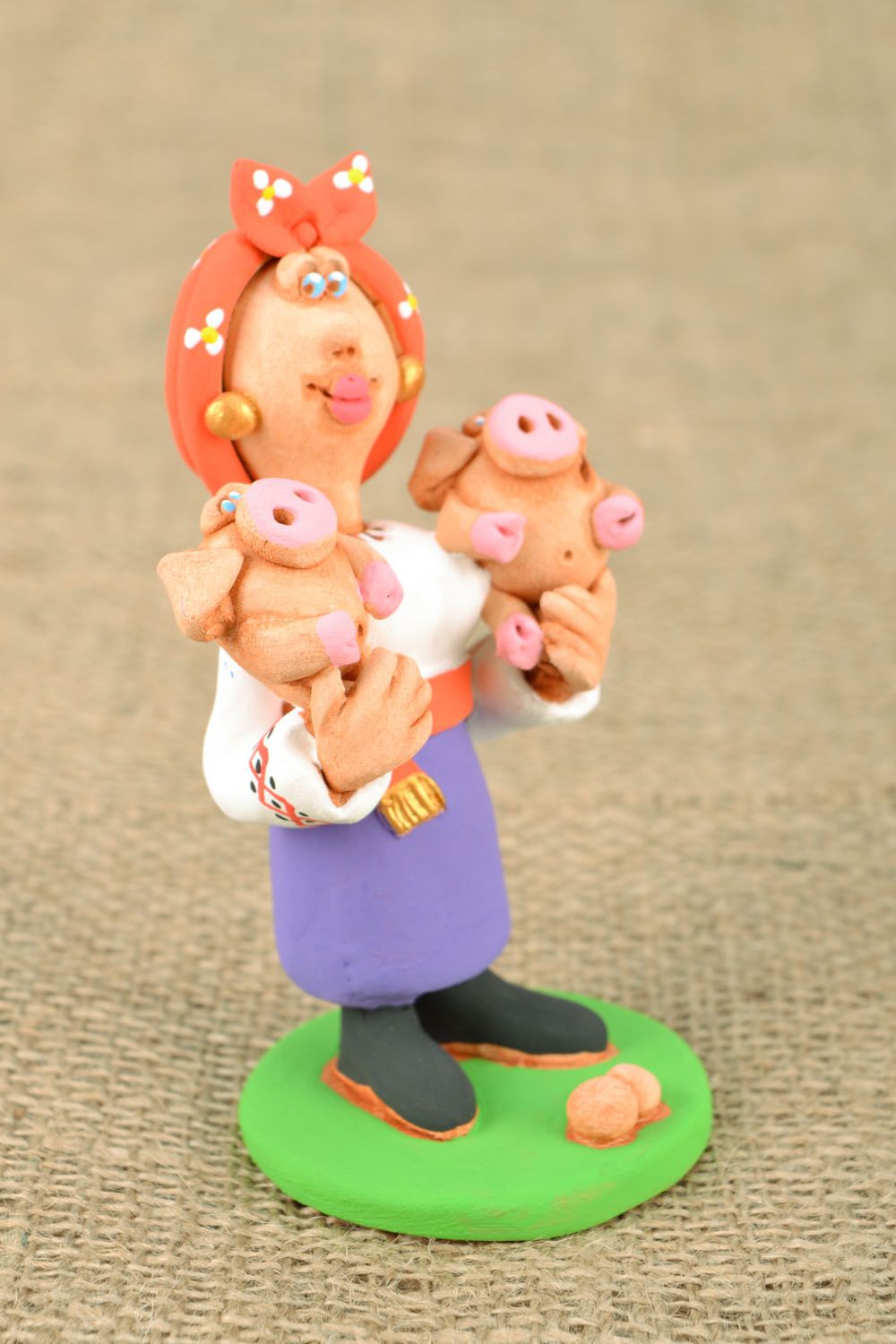 Clay figurine Cossack woman with piggies photo 5