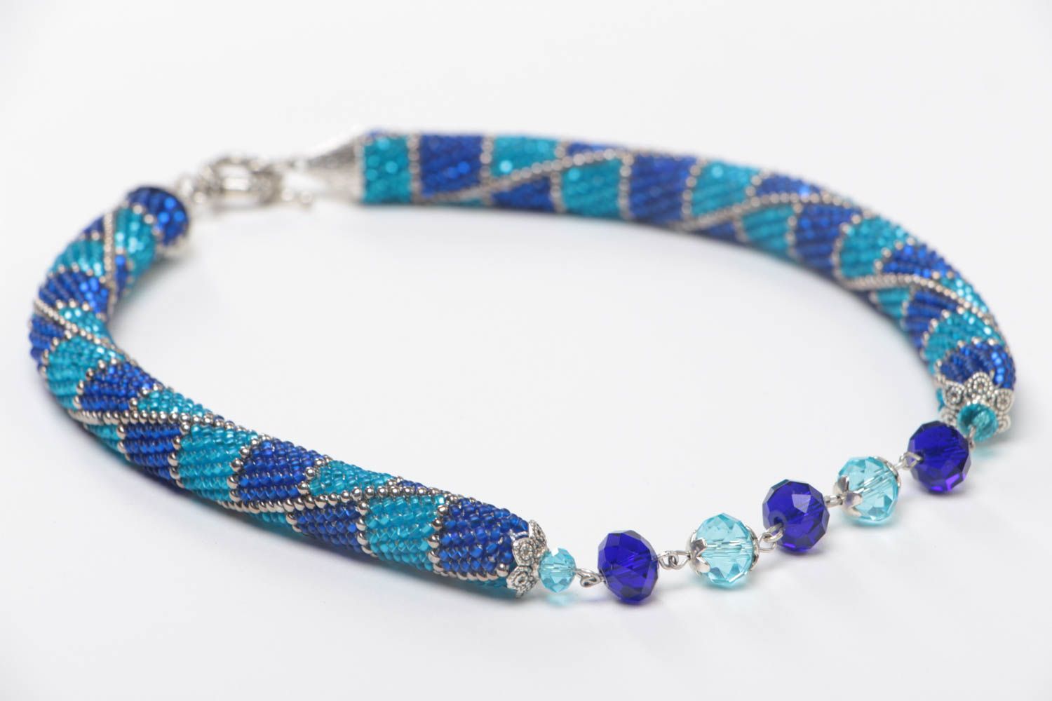Handmade stylish beaded cord necklace in blue color palette with faceted beads photo 3