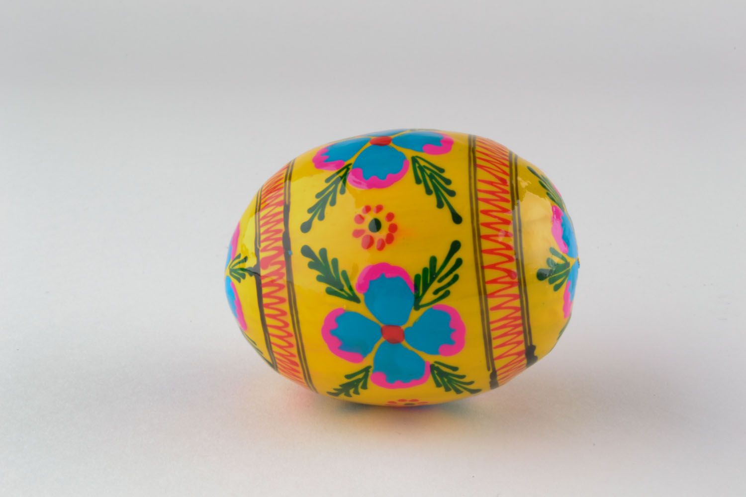 Painted wooden egg for decoration photo 2