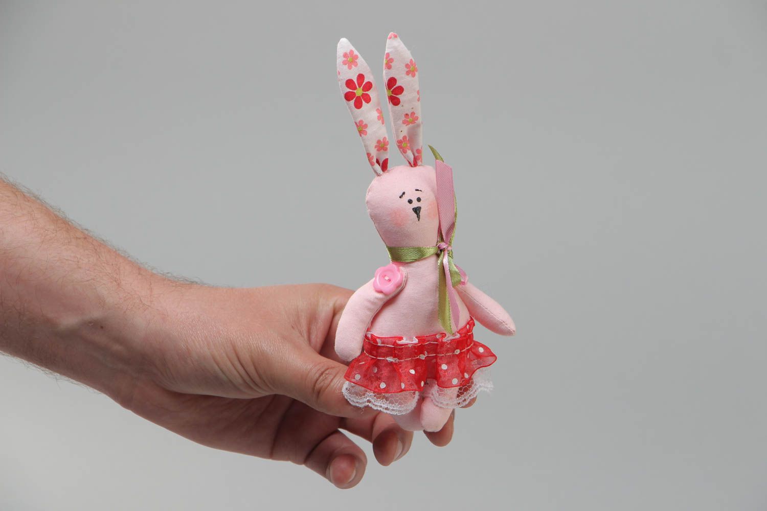 Handmade small soft toy sewn of cotton fabric in the shape of long eared rabbit photo 5