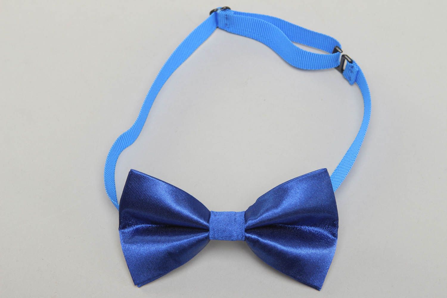 Satin fabric bow tie of blue color photo 1