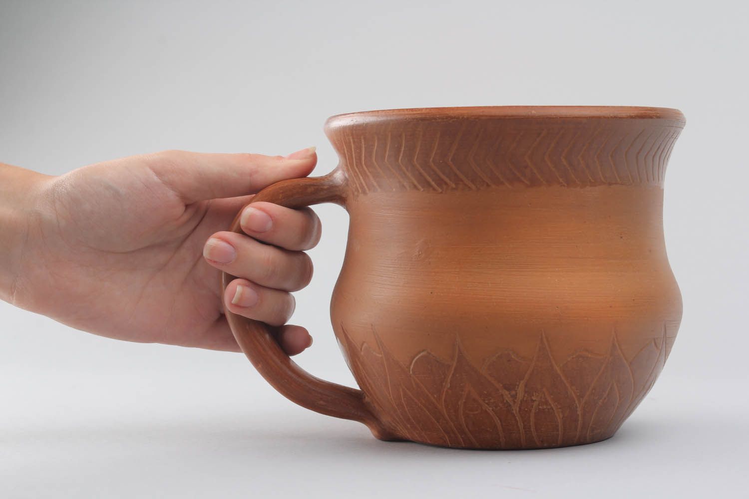 Terracotta color Mexican style clay cup with handle and rustic pattern photo 2
