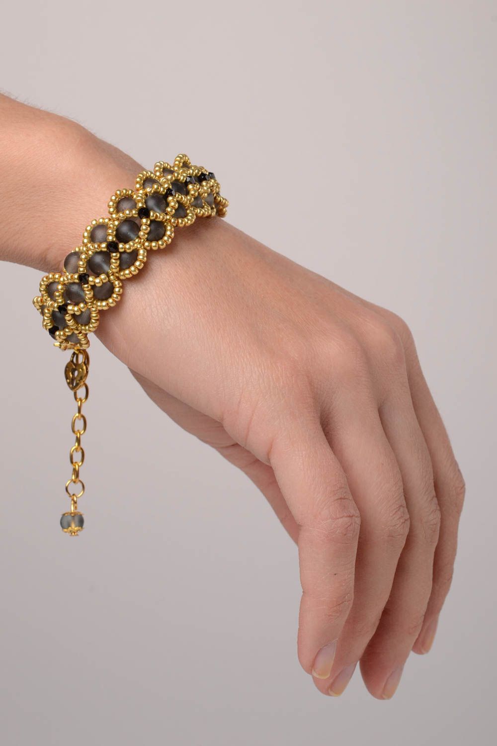 Glass black and gold color beads all-size bracelet for women photo 2