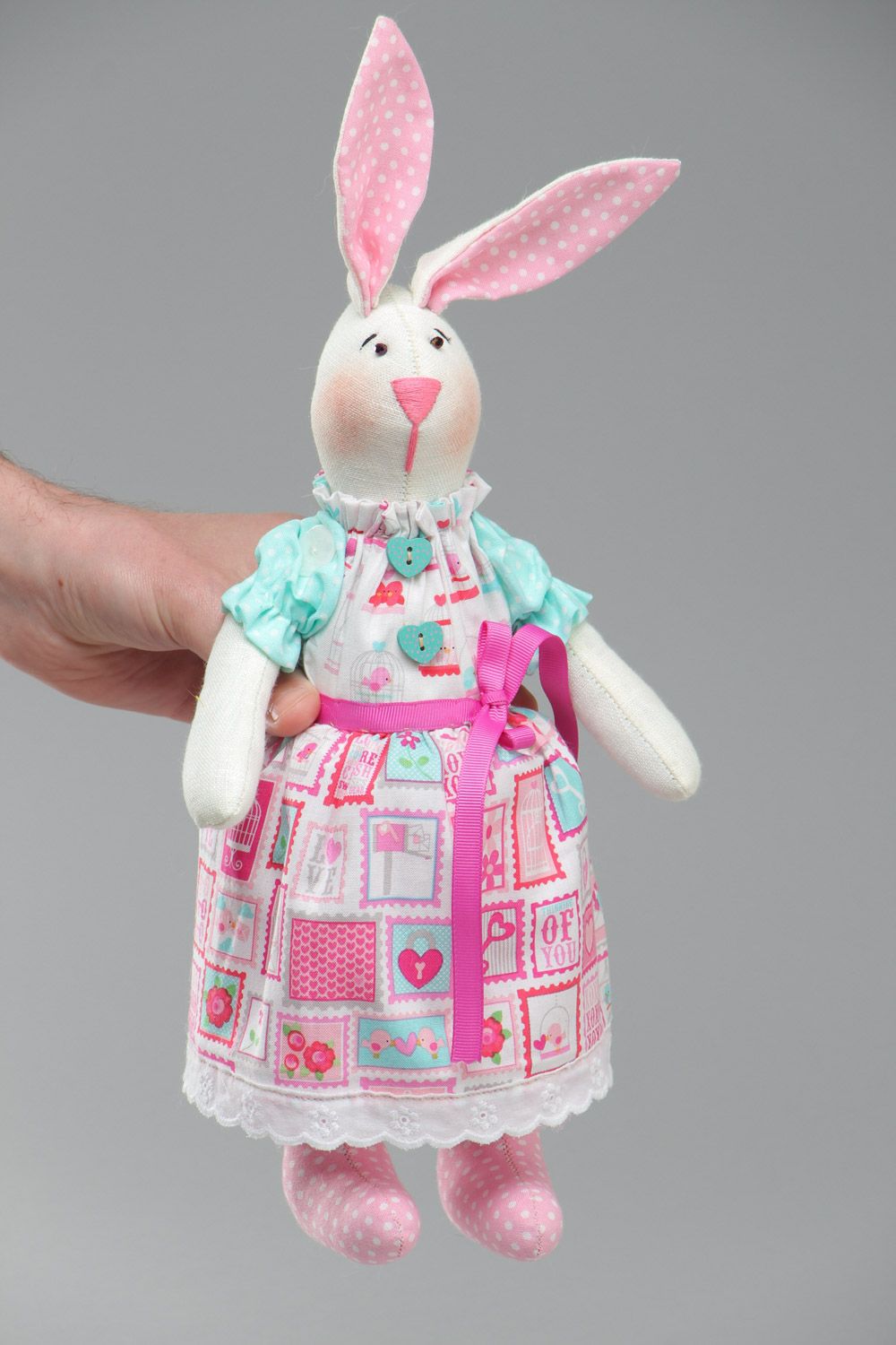 Cute handmade soft toy sewn of natural fabrics Rabbit with pink ears and dress photo 5