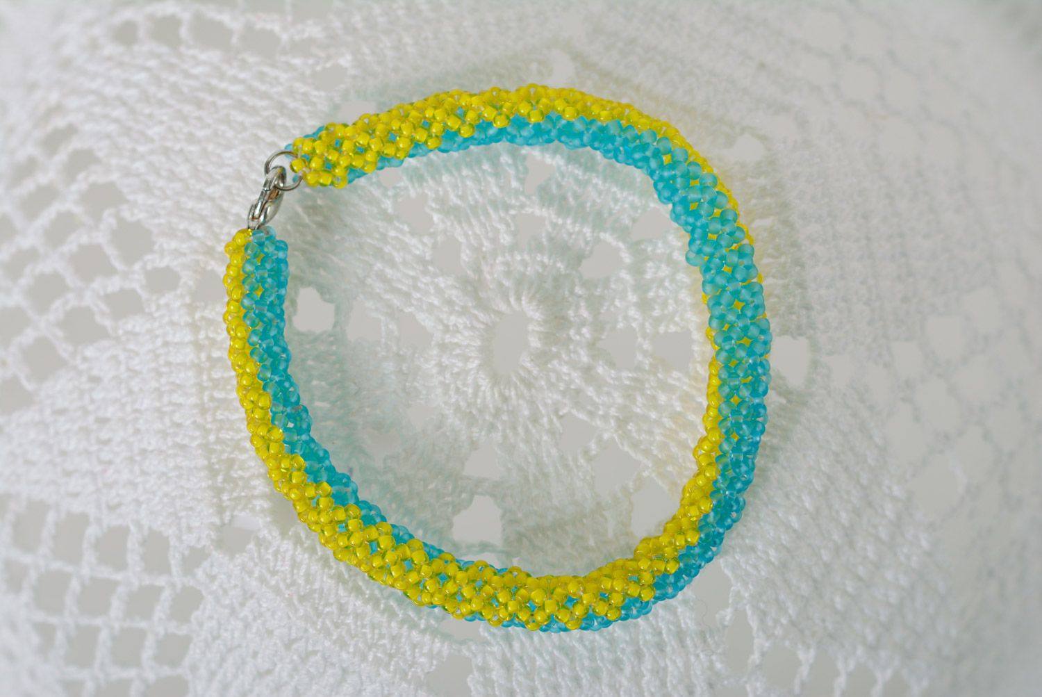 Thin handmade wrist bracelet woven of yellow and blue beads in Ukrainian style photo 5
