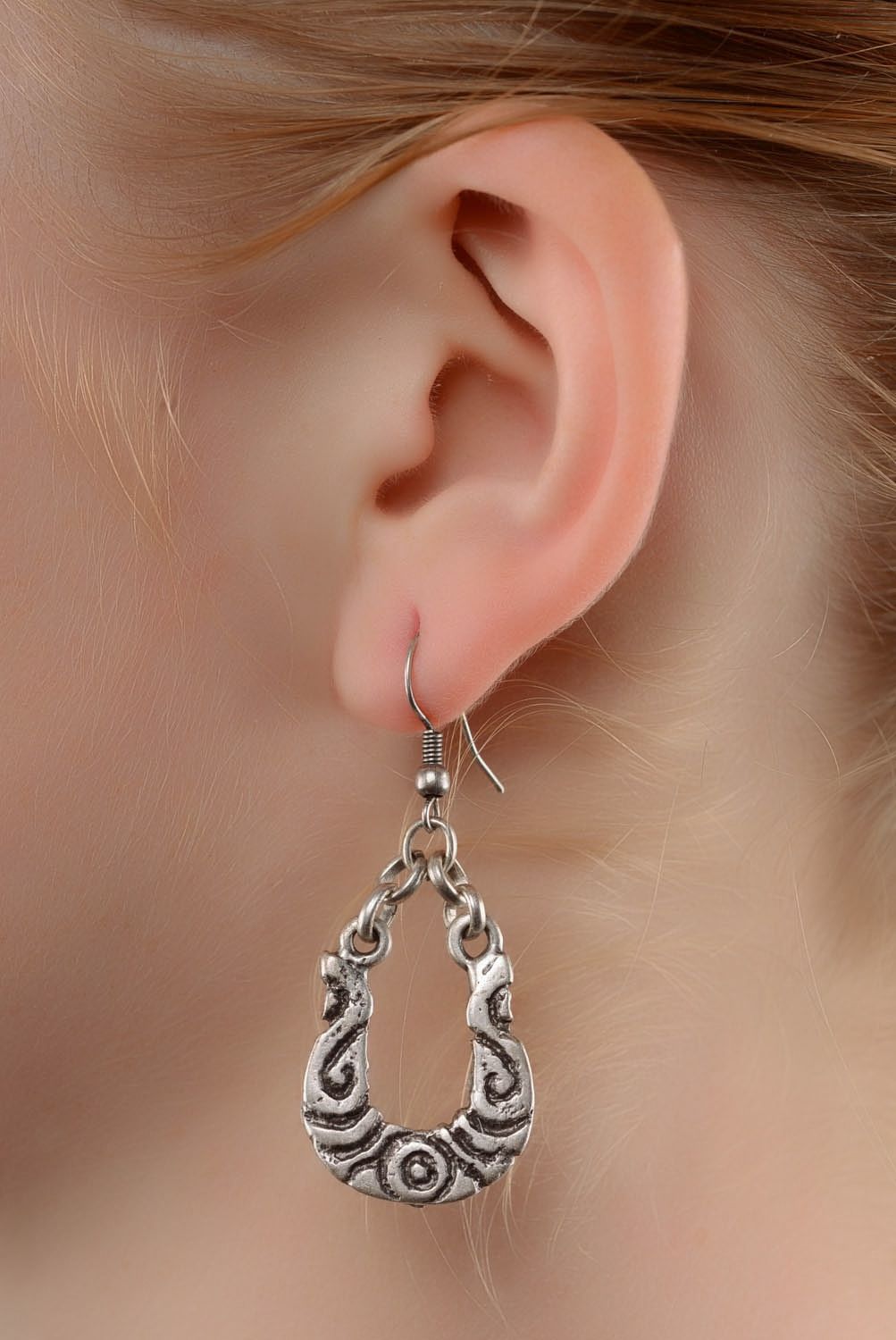 Metal ethnic earrings photo 4