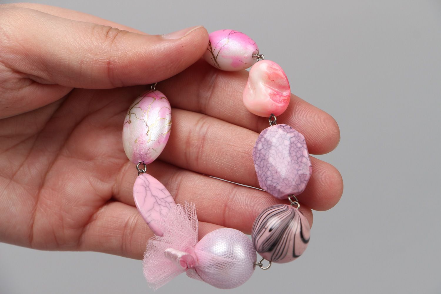 Bracelet en perles plastiques fait main bijou original et pratique pour femme photo 4