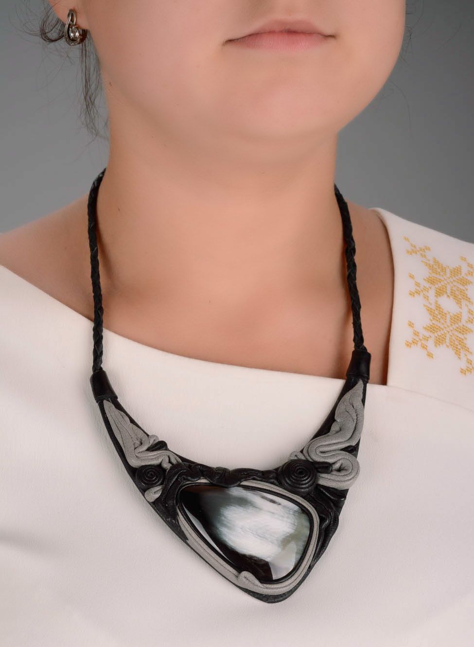Necklace made of cow horn and leather photo 4