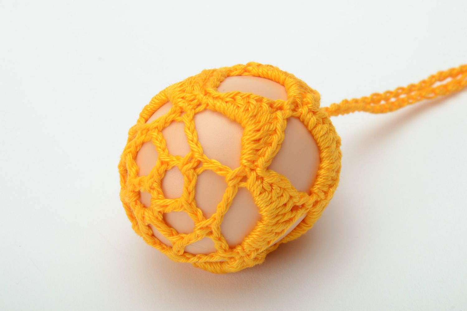 Homemade yellow decorative Easter egg pendant in lacy cover photo 2