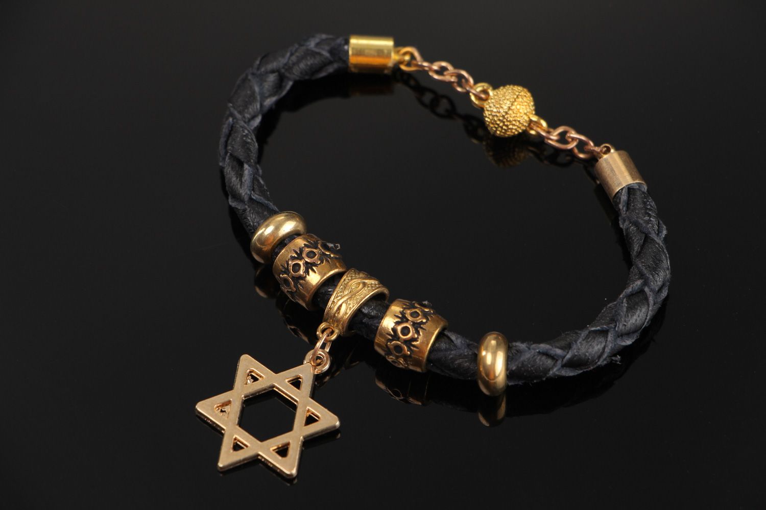Handmade wrist bracelet woven of genuine leather with metal charm Star of Judah photo 1