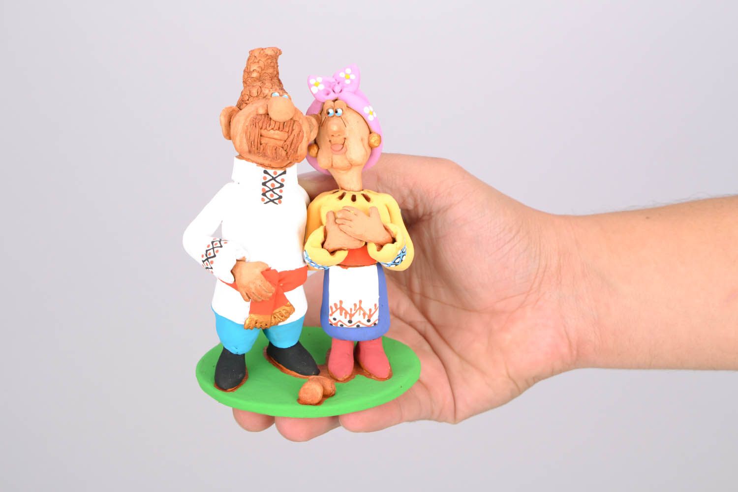 Figurine céramique 'Cosaque et sa femme bras dessous bras dessus' photo 2