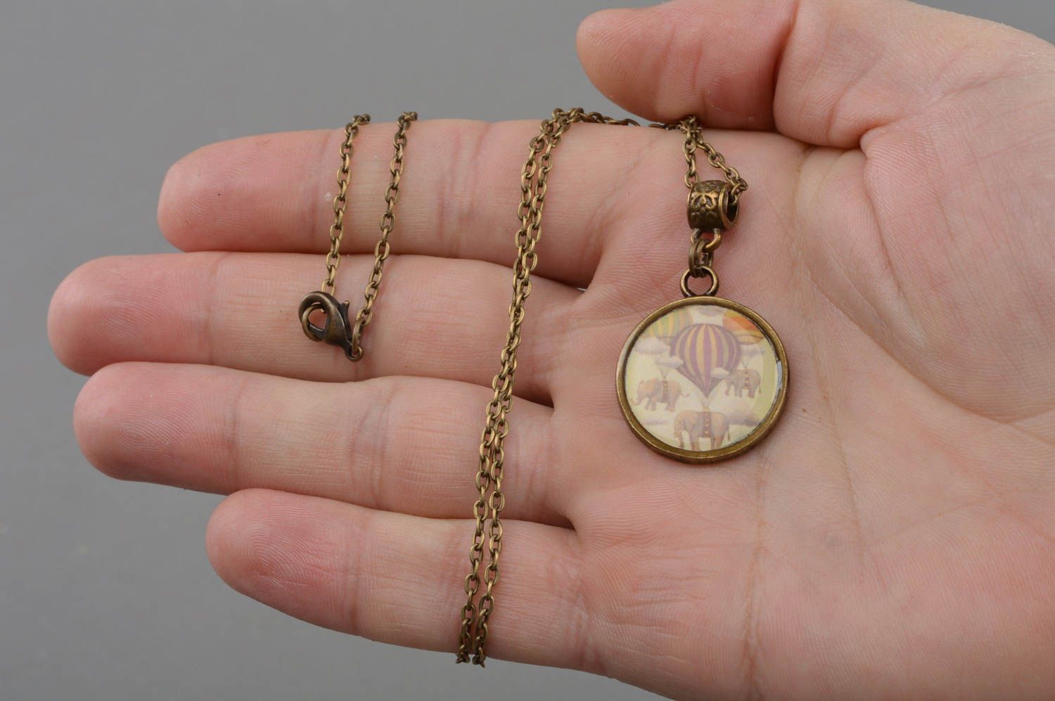Beautiful handmade decoupage pendant coated with epoxy and equipped with bronze-like chain photo 4