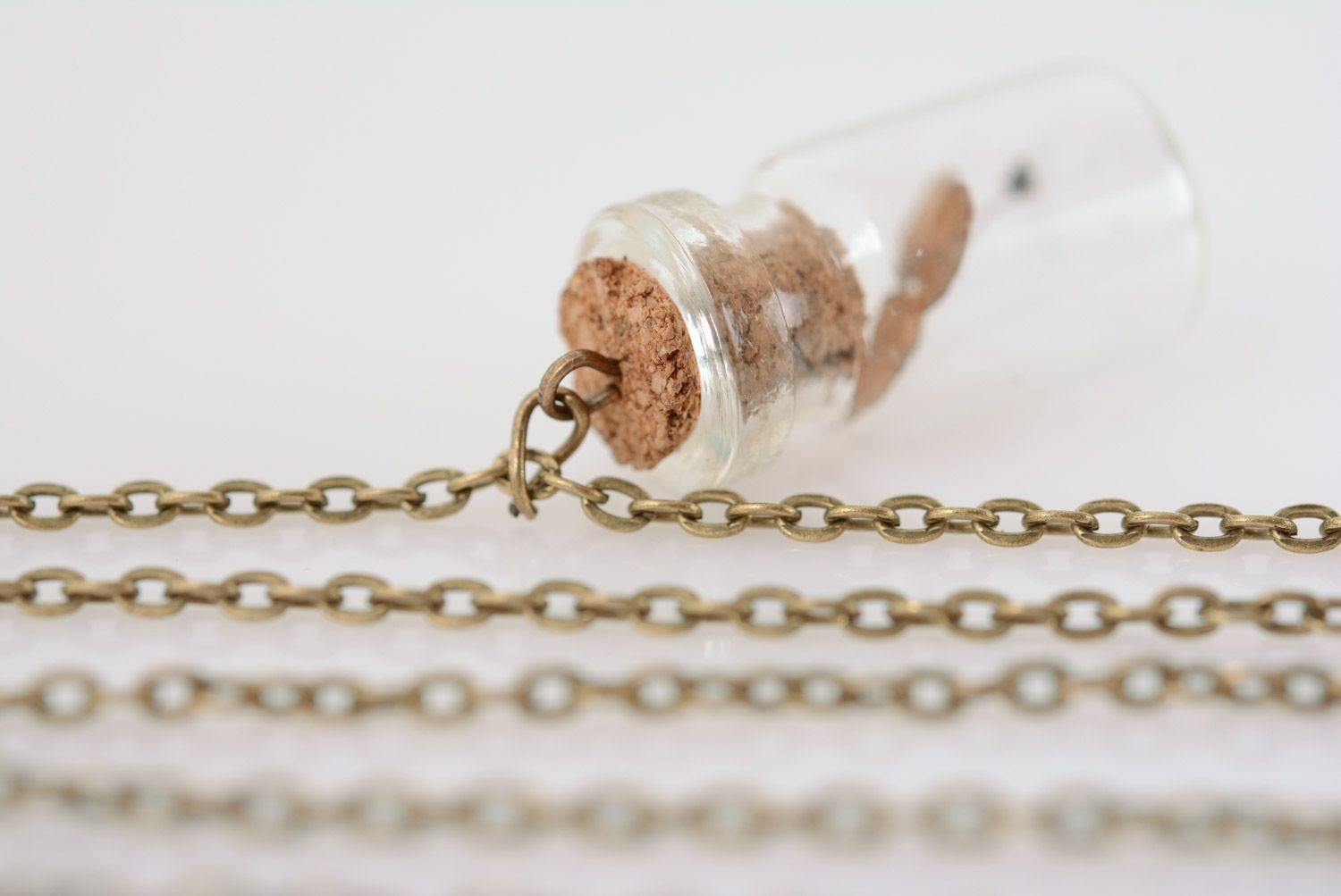 Small handmade glass vial with cork pendant with plant inside on metal chain photo 5