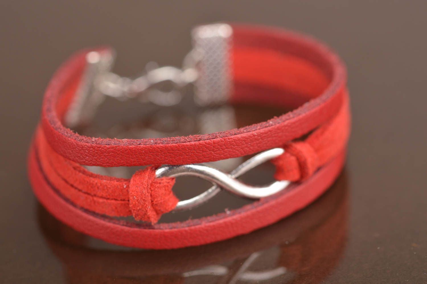 Handmade designer genuine leather and suede wrist bracelet with infinity sign photo 3