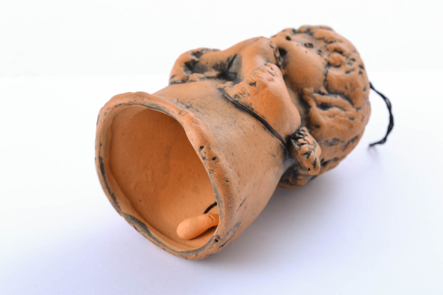 Campanilla cerámica artesanal con forma de niño foto 2