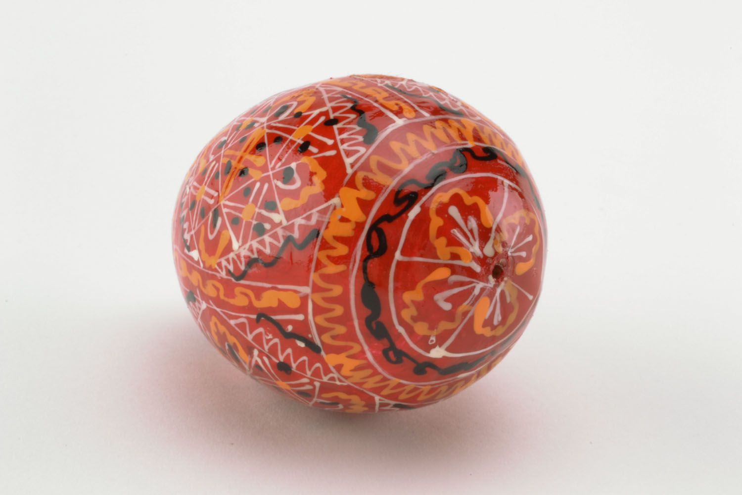Wooden egg in red colors photo 4