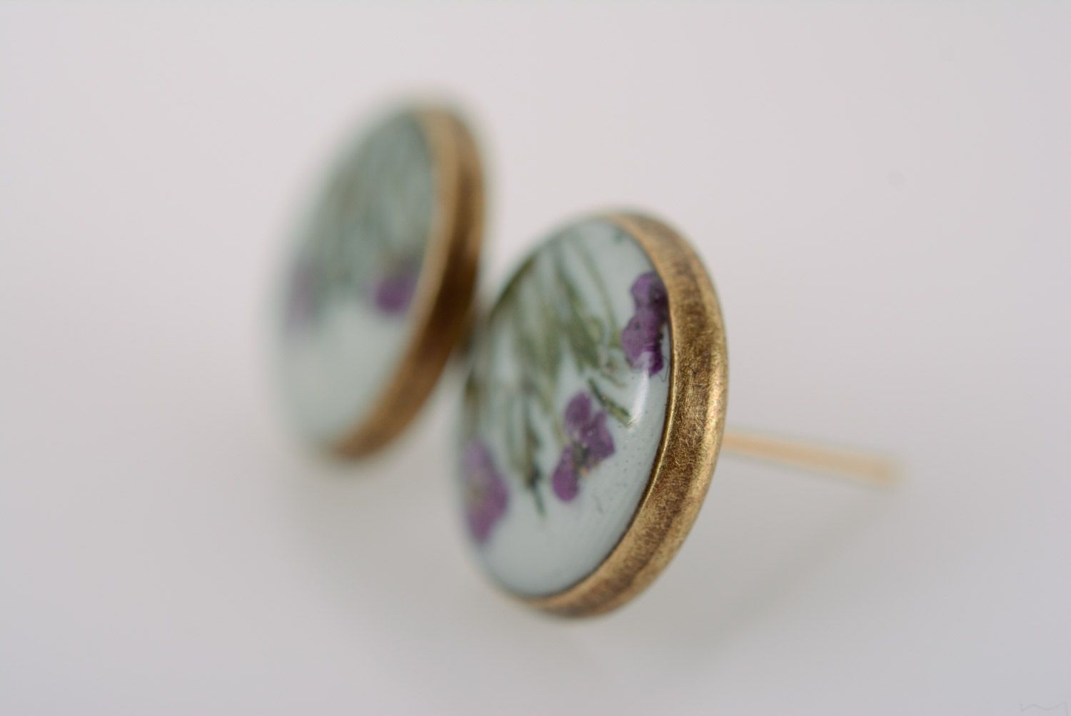 Handmade round stud earrings with tender floral composition in epoxy resin photo 4