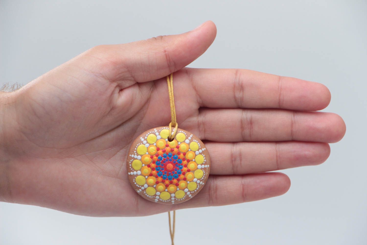 Unusual handmade designer ceramic round pendant with bright dot painting on cord photo 5