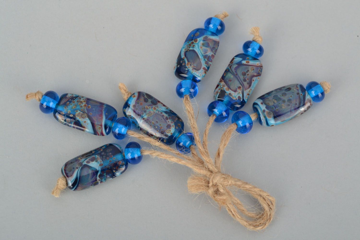 Handmade glass beads of blue color photo 1