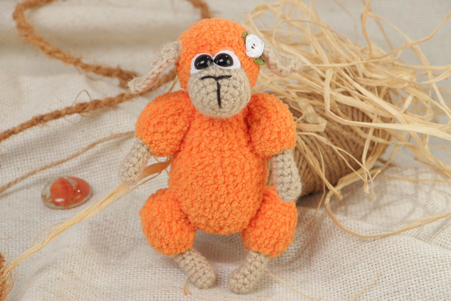 Handmade crochet soft toy in the shape of orange sheep for kids photo 1