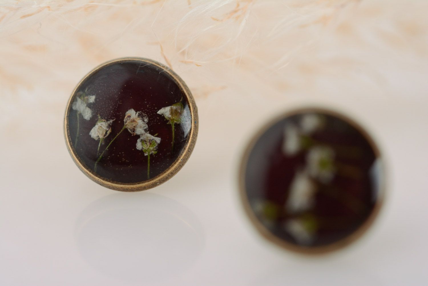 Small flat round dark homemade stud earrings with dried flowers in epoxy resin  photo 3