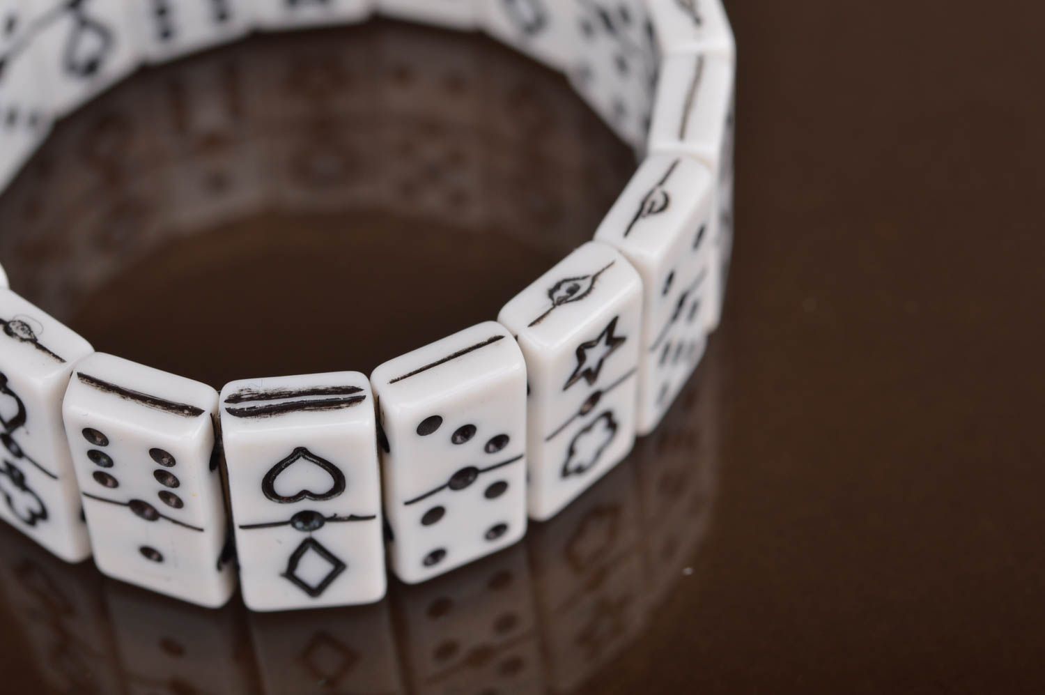 Black and white bracelet made of flat beads in shape of dominoes counters photo 4