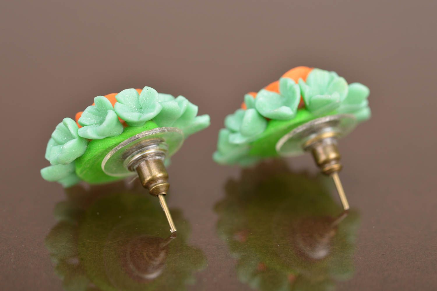 Handmade green and orange stud earrings made of polymer clay in shape of flowers photo 3