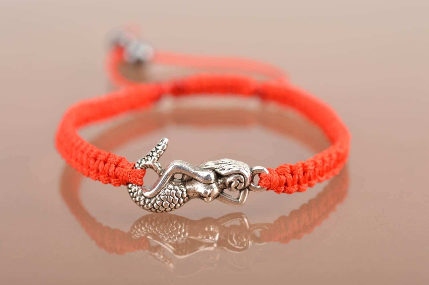 Handmade woven thin cute red bracelet made of silk threads with mermaid photo 2