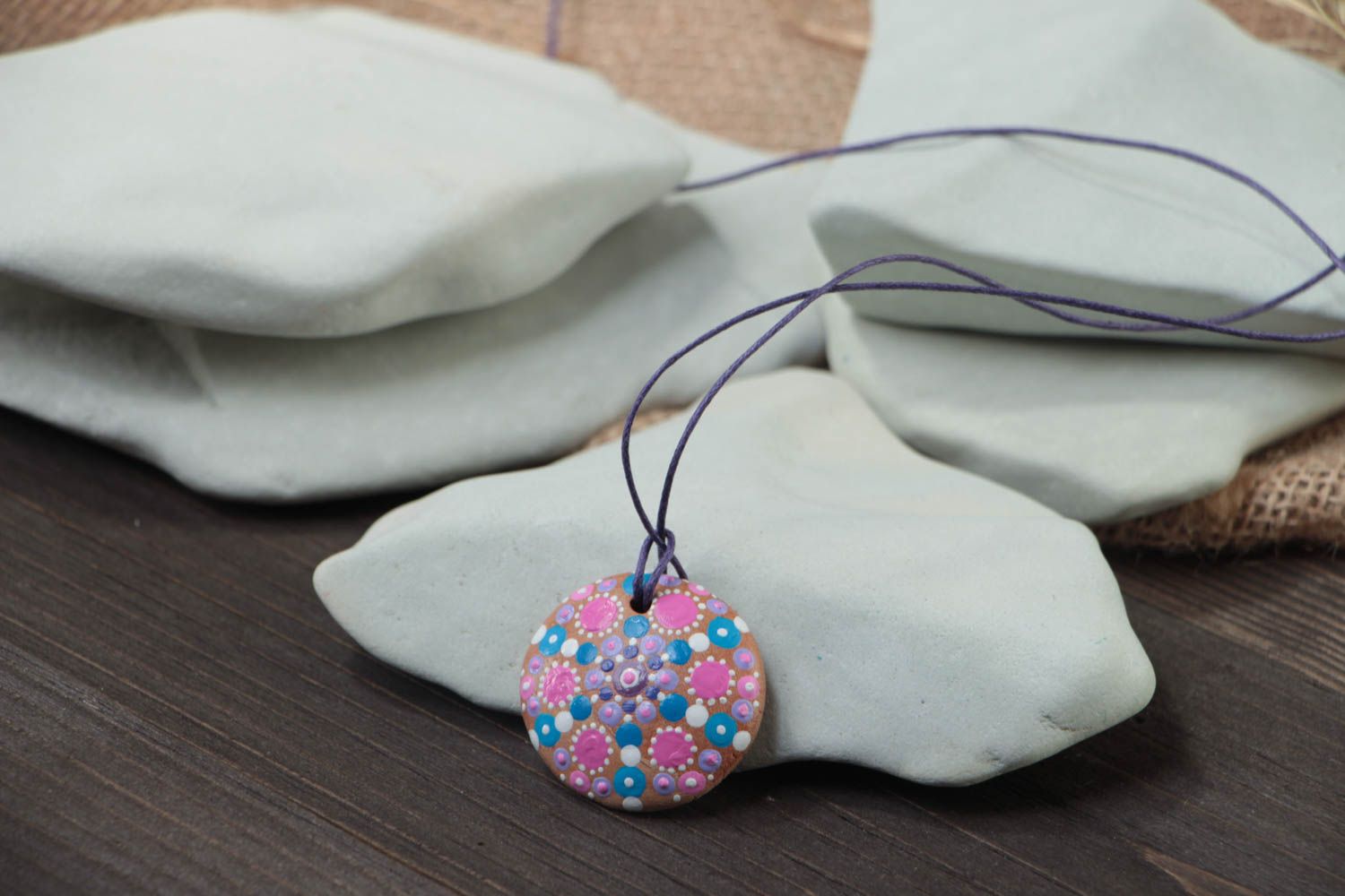 Handmade designer women's round ceramic pendant painted with acrylics on cord photo 1