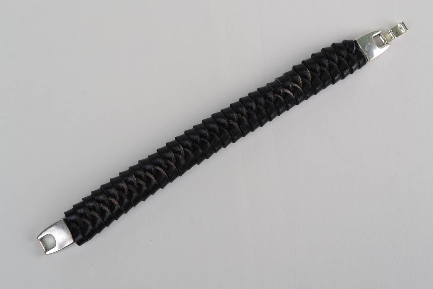 Beautiful handmade designer men's black woven leather bracelet with metal clasp photo 5