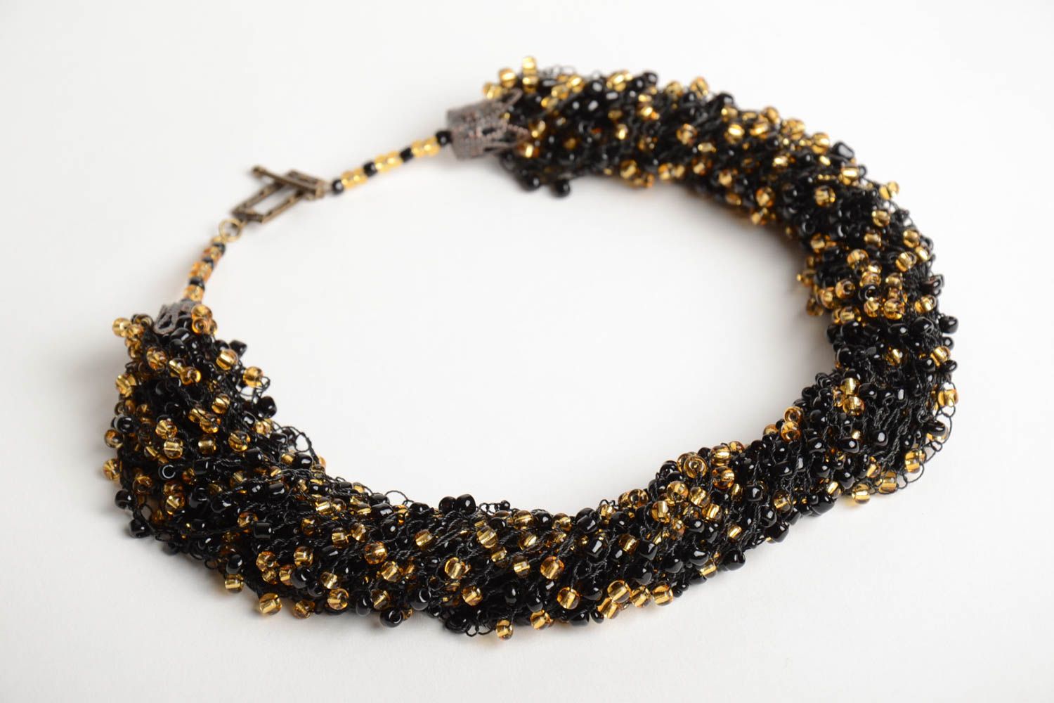 Handmade long massive necklace crocheted of black and golden Czech beads photo 5