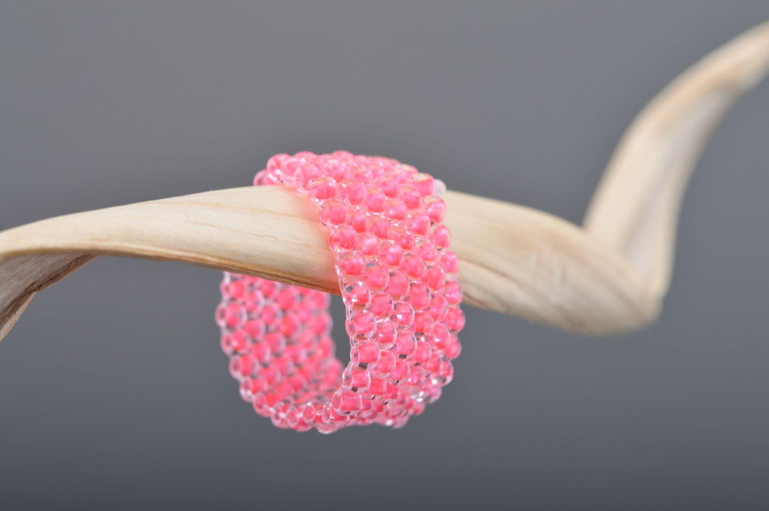 Handmade simple ring woven of beads of pink color and fishing line for girls photo 1