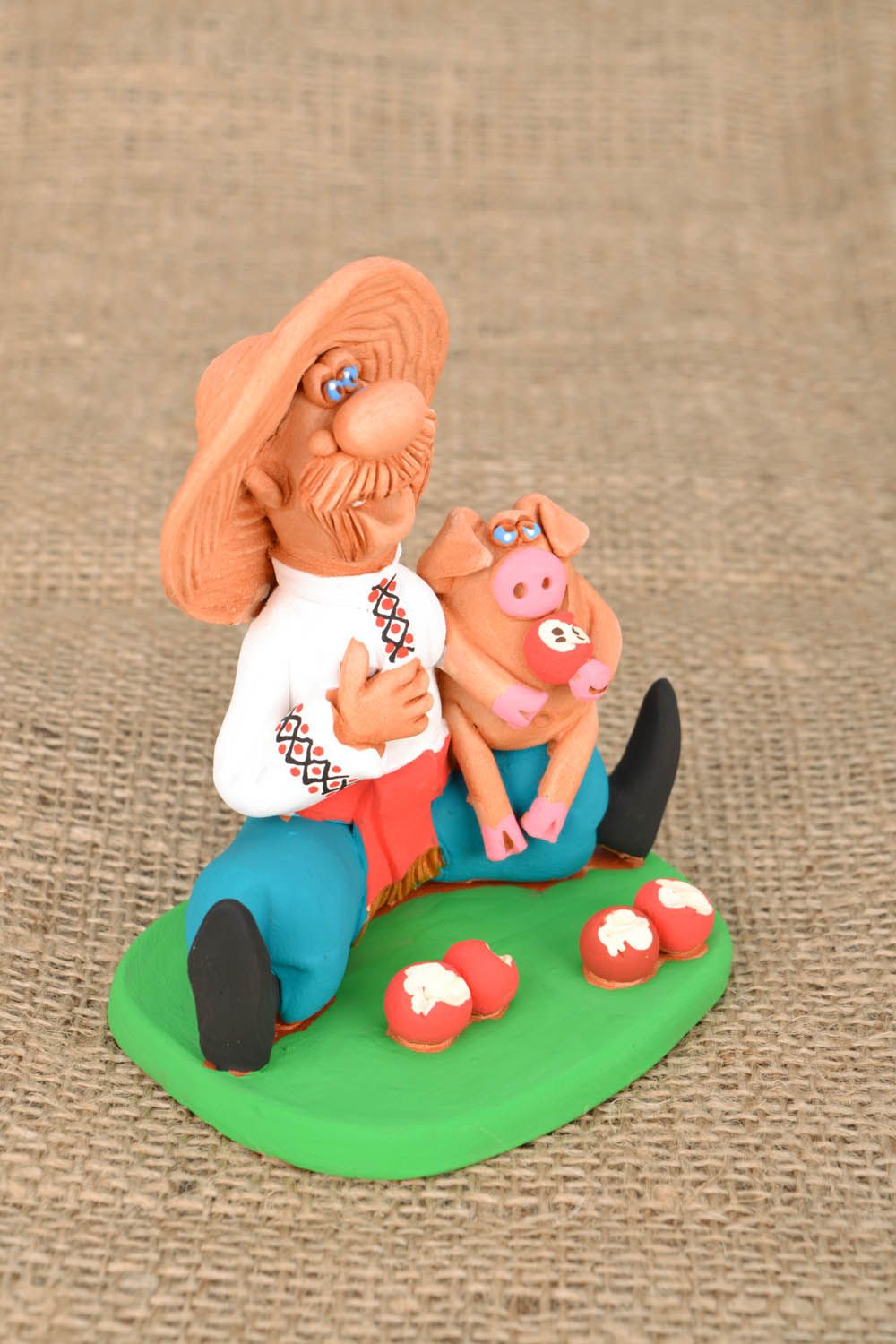 Keramik Statuette Kosak mit Schwein foto 1