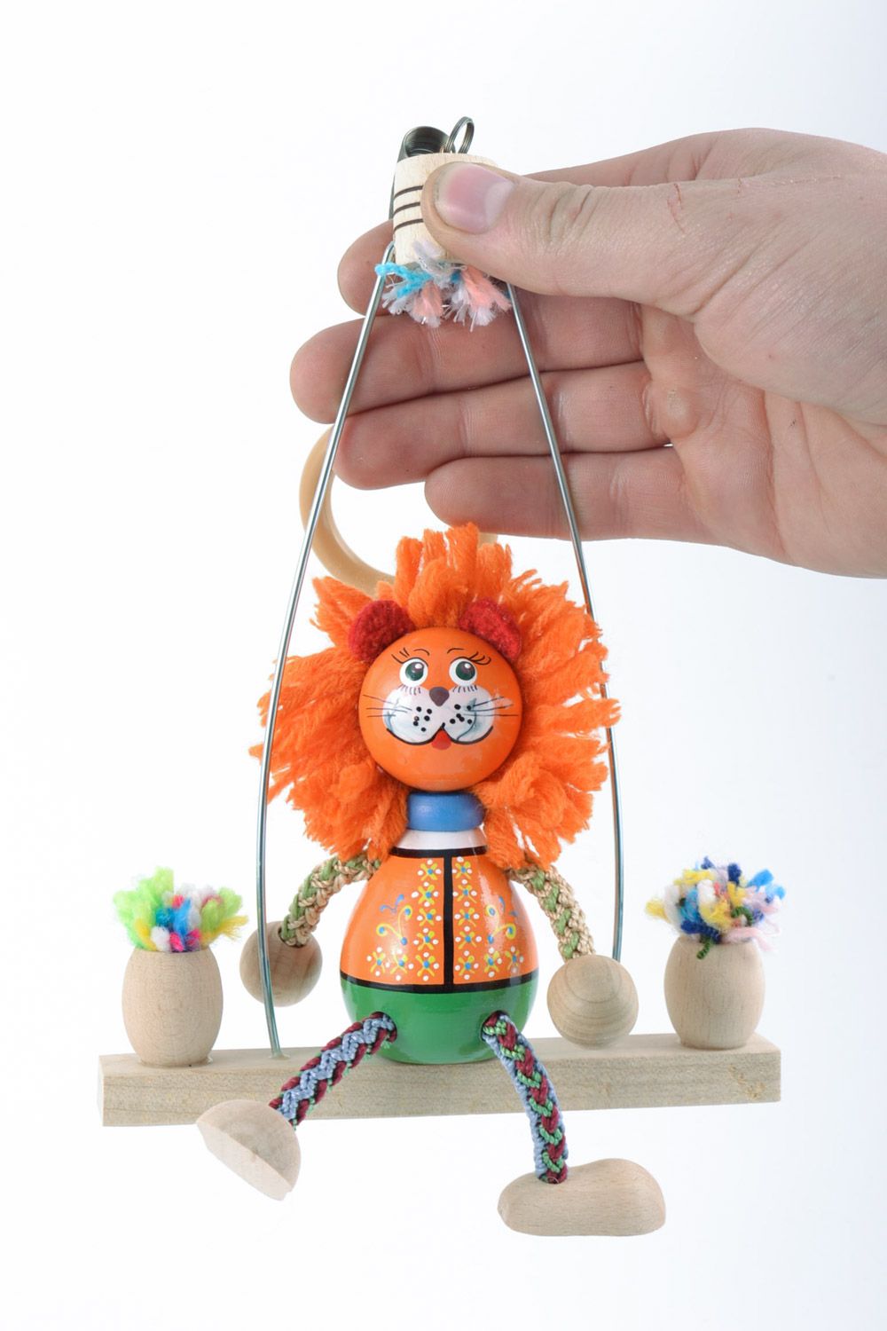 Eco friendly handmade wooden toy lion on a swing funny cute painted doll photo 1