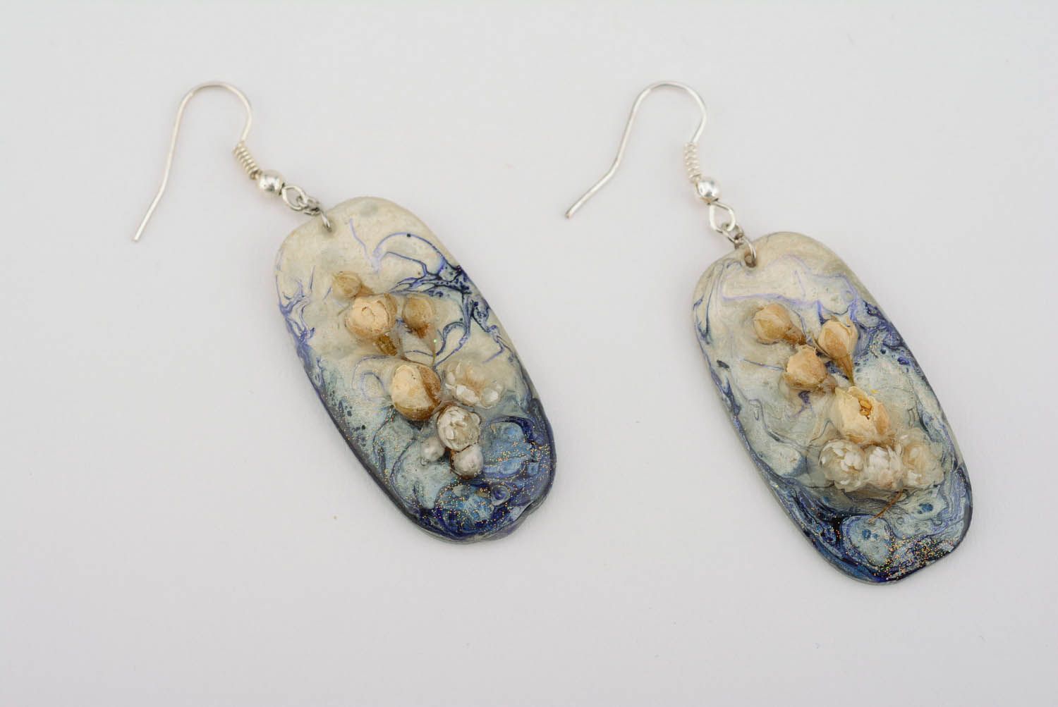 Earrings made of flowers and epoxy resin photo 5